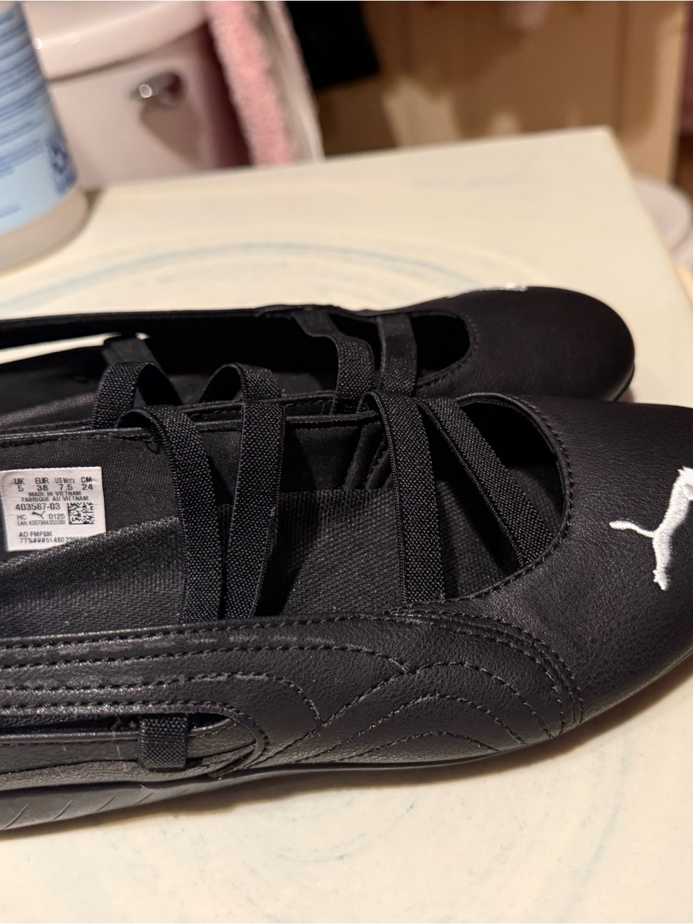 Puma Black Ballet Flats with White Logo
